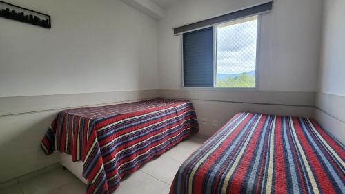 Condomínio Costa Azure - Apto com 2 Dormitórios, 2 Banheiros e Ar Condicionado ao Lado da Praia de Riviera de São Lourenço e Itaguaré Condomínio Costa Azure - Apto com 2 Dormitórios, 2 Banheiros e Ar Condicionado ao Lado da Praia de Riviera de São Lourenço e Itaguaré