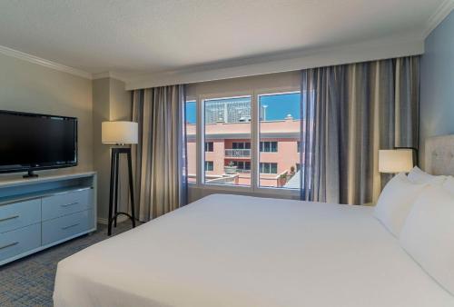 Two-Bedroom Deluxe Suite with Kitchen and Pool View