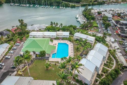 Superbe studio avec CITERNE d'Eau et Piscine, En plein coeur de la Marina! Proche Aéroport & Ferry (Superbe studio avec CITERNE d'Eau et Piscine, En plein coeur de la Marina! Proche Aeroport & Ferry) in Baimbridge