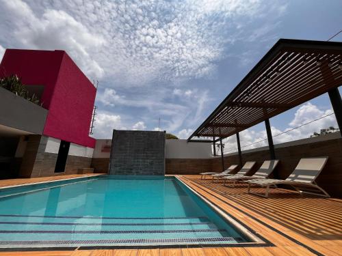 Swimming pool, Hotel Meson de la Chinantla in María Luisa