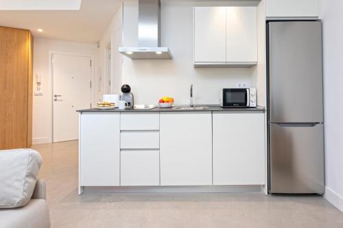 厨房, Apartamentos Costa Tropical by Rent Me in 莫特瑞尔