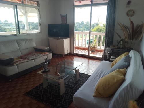 jaettu olohuone/TV alue, La SAISONNIERE RELAIS in Gosier