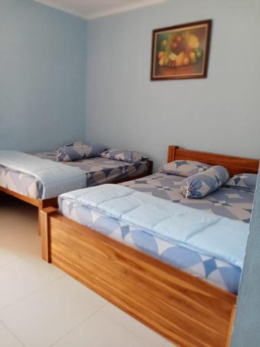 SETYA HOMESTAY TANJUNG LESUNG Room Type - Deluxe Double Room (2 Adults + 1 Child)