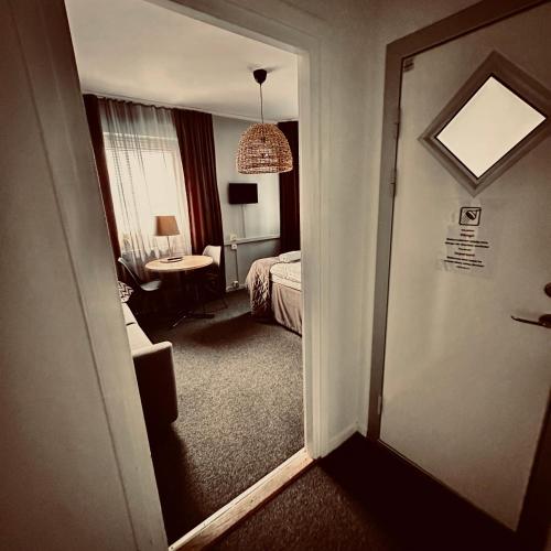 CarlstadCity H Boutique Hotell - Tap to explore photos