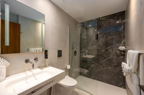 Melpo Antia Hotel & Suites Room Type - Deluxe Family Room Melpo Antia Hotel & Suites Room Type - Deluxe Family Room