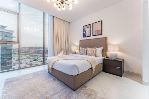 Glimpse of Burj Khalifa and Short Drive to Recreational Hubs 1BR, District One Phase III Residences 12, Mohammed Bin Rashid Al Maktoum City by Deluxe Holiday Homes, Дубай (фото 4)