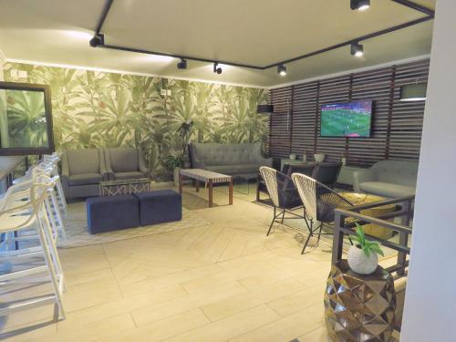 Közös társalgó / TV, San Lameer Hideaway by Top Destinations Rentals in Délbroom