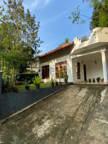 A szálláshely kívülről, Dili's Home Stay in Pallekele