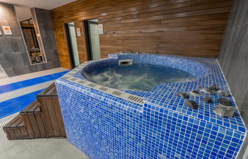 热水浴池, New Gudauri GN Apartments in Atrium in 古多里