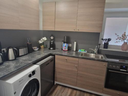 Nahe Kiel, Neues Ferienhaus an der Ostsee mit Sauna,Kamin und Garten,Parkplatz,5 Betten, 3 Schlafzim in Osdorf