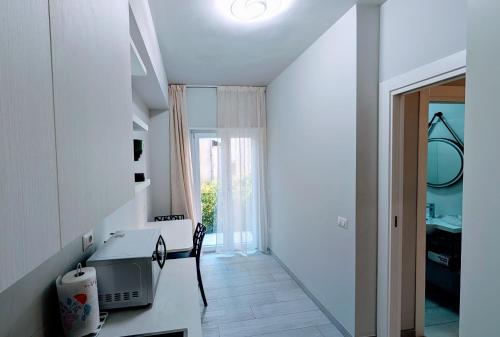 One-Bedroom Apartment with Balcony and City View image 10