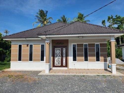 ทัศนียภาพภายนอกโรงแรม, Homestay Cheq Gu 747 in อาเยอร์ฮิตัม