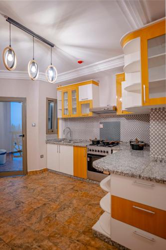 Kitchen, RESIDENCE ISABELLA in Douala