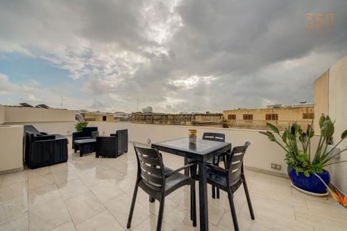 Penthouse in Mosta with city views & terrace by 360 Estates, Mosta (fotografie 6)