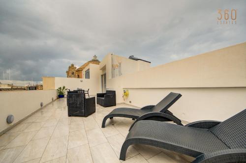 Penthouse in Mosta with city views & terrace by 360 Estates, Mosta (fotografie 10)