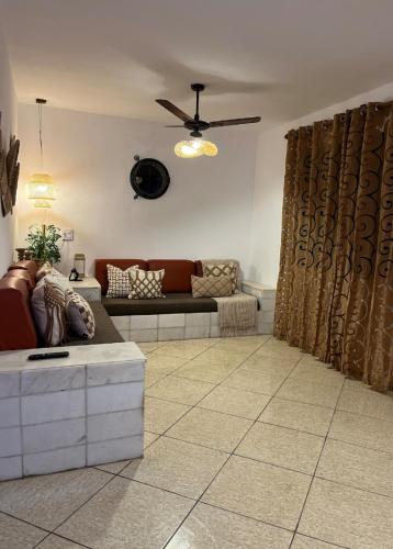 Shared lounge/TV area, Hostel Dunas & Mar - Hostel e Suites - Cabo Frio in Cabo Frio