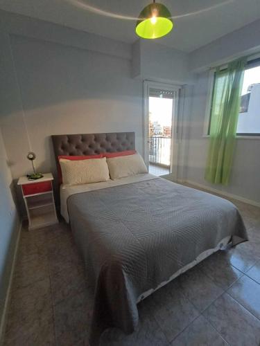 One-Bedroom Apartment with Balcony and City View image 2