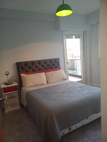 One-Bedroom Apartment with Balcony and City View image 1
