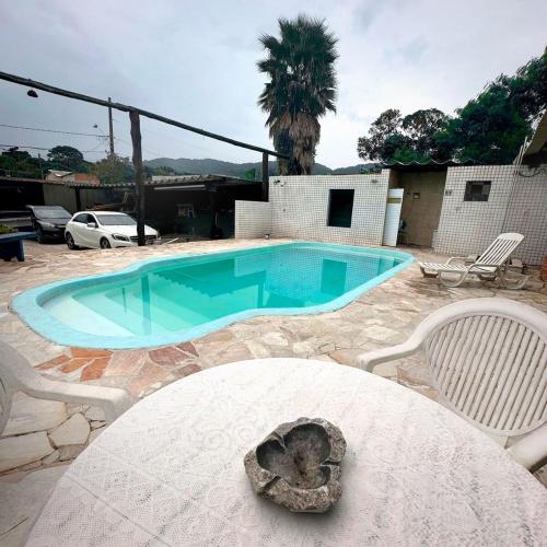 Linda casa de praia com amplo lazer in Jardim Virginia