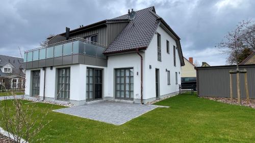 Vedere exterior, Neue Reihe 1 Wohnung 3 "Nordflair" in Zingst