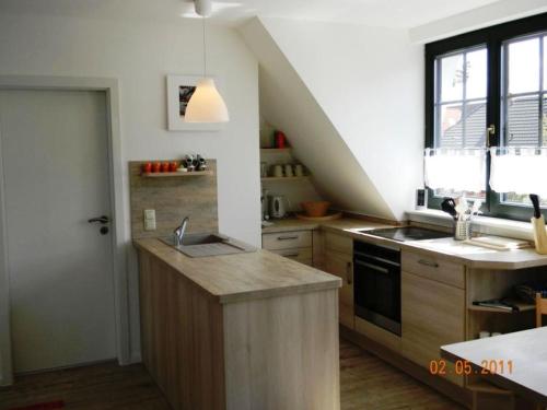Кухня, Ferienwohnung Malvenhaus in Цингст