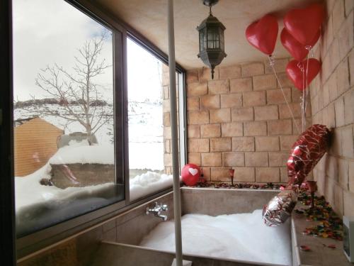 浴室, 法拉雅木屋 (Villetta di Faraya) in 法拉雅