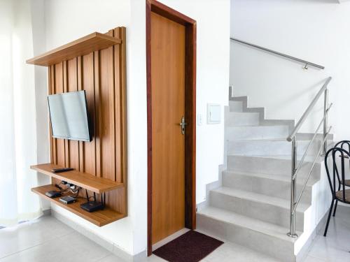 Közös társalgó / TV, Apartamento 2 Village Mariah Perto da Praia 450m in Mutari