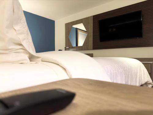 Standard Room with Two Queen Beds room in Holiday Inn Express Mérida By IHG