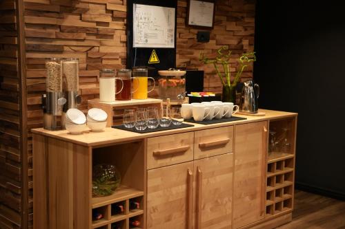 อาหารและเครื่องดื่ม, La Suite Boutique Hotel in บโลกู