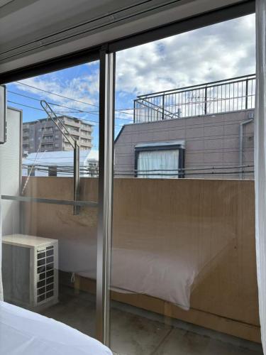 Nishi-Ike Apartment Room 3, Tokio (Foto 7)
