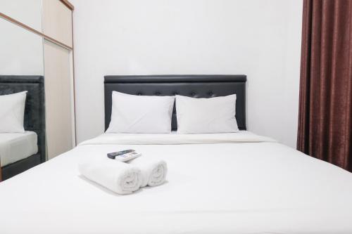 Modern Classic Studio at Apartment Parahyangan Residence By Travelio, Bandung