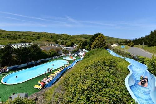 Swimming pool, Luxury 3 bedroom Maple View Lodge, Newquay, Cornwall in Trebarber