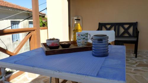 Balkons/terase, To Portoni Guesthouse in Mikros Gialos