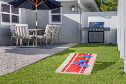 Resort Villa! Heated Pool with Golf plus Firepit and Turf Sports