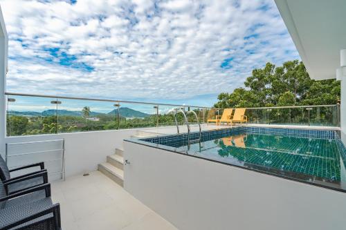 Swimming pool, Splash Beach Resort Phuket in Mai Khao