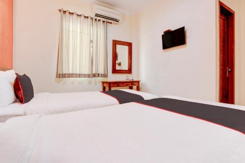 Delxue Twin Room image 4