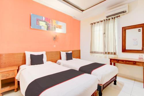 Delxue Twin Room room in Collection O Jalan Malioboro Near Lempuyangan Station Formerly Hotel Vala