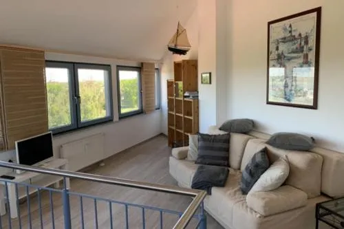 Inselblume 33 - Ferienwohnung im Turm der Strandburg in Burgtiefe auf Fehmarn , Deutschland