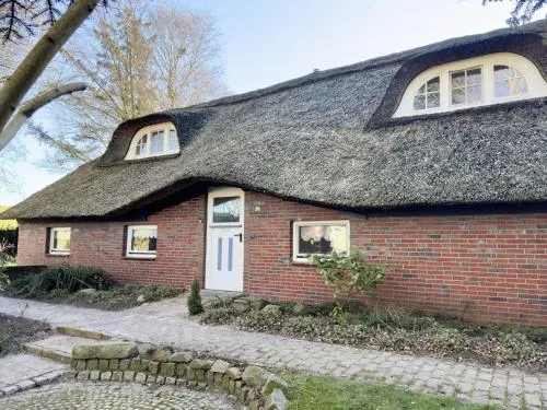 Ferienwohnung im Reetdachhaus, Burhave in Burhave, Deutschland