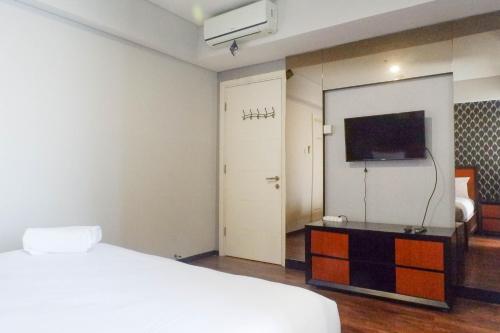 Vibrant and Luxurious 2BR Apartment at Trillium Residence Surabaya By Travelio - image 4