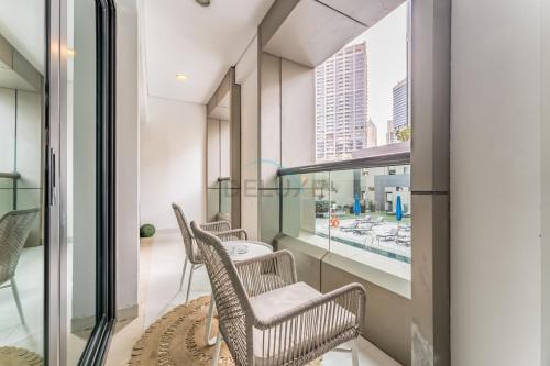 Pool and City View 1BR Near Dubai Water Canal, The Cosmopolitan, Business Bay by Deluxe Holiday Homes, Dubai (Foto 3)