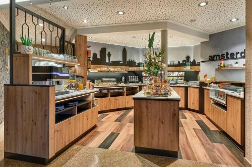 Comida y bebida, NordWest-Hotel Amsterdam in Bad Zwischenahn