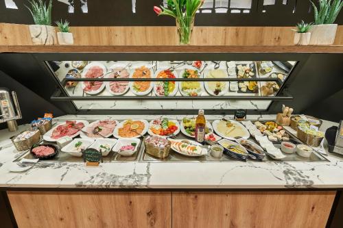 อาหารและเครื่องดื่ม, NordWest-Hotel Amsterdam in บาด สวิสเชนอาน