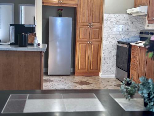 ห้องครัว, Chaleureux 3BDR à 5 min de Montreal (Chaleureux 3BDR a 5 min de Montreal) in ลงเกย (QC)
