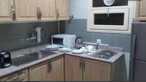 쿠웨이트 Pyramiza Hotel Al Mangaf فندق بيراميـــزا المنقف 2성급 게스트하우스 객실