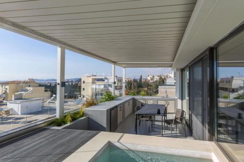 Raise Pagrati Serviced Apartments - Tap to explore photos