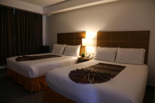 Discover the Best of Santo Domingo in Style: Book Your Stay at Hotel Aladino