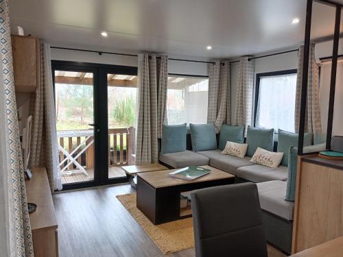 MH 558 SPACIOSA 2 chambres ET 1 salle de bain 45m2 2 terrasses avec vue sur foret dans camping 4étoiles MH 558 SPACIOSA 2 chambres ET 1 salle de bain 45m2 2 terrasses avec vue sur foret dans camping 4étoiles