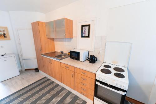virtuve, MonteurGut Apartments Linde in Lindern (Oldenburg)