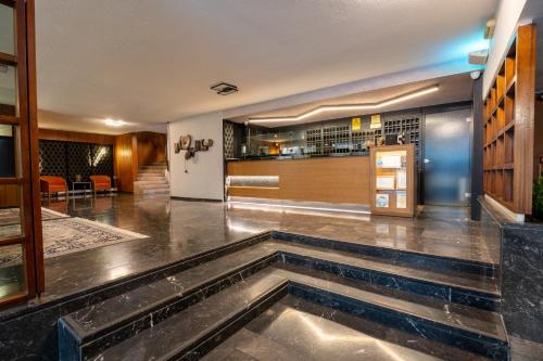 奧爾加皇后酒店 (Queen Olga Hotel) in 新海灘區